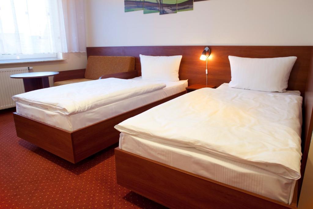 Hotel Podroznik Koszuty Szoba fotó