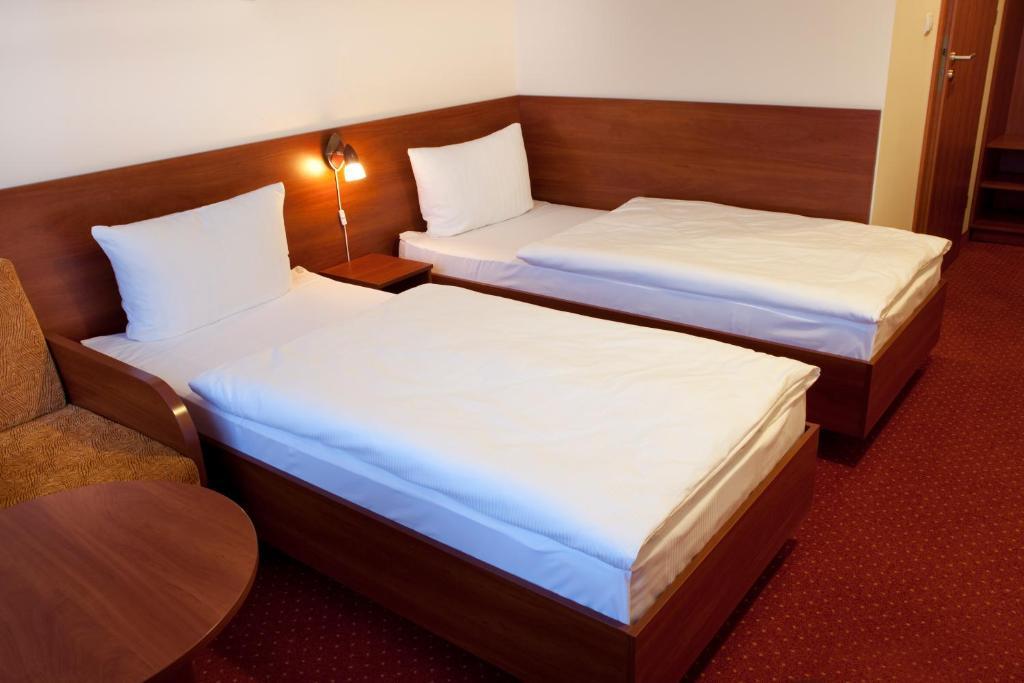 Hotel Podroznik Koszuty Szoba fotó
